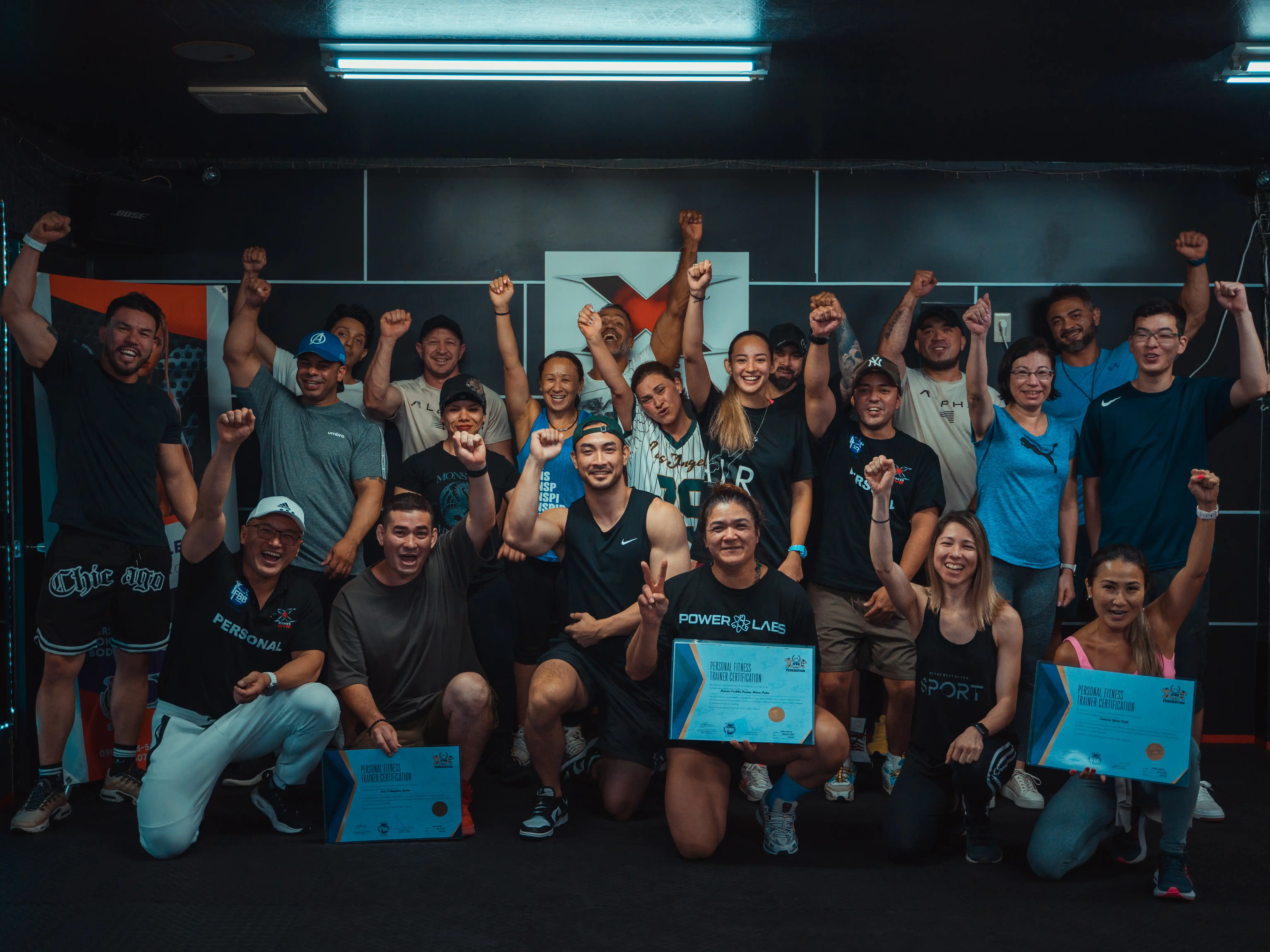 Equipe da X Fitness Gym em ambiente de energia positiva